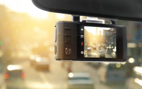 Digital video recorder car camera for safety on the road accident, Technology recorder device capturing video of front of vehicle.